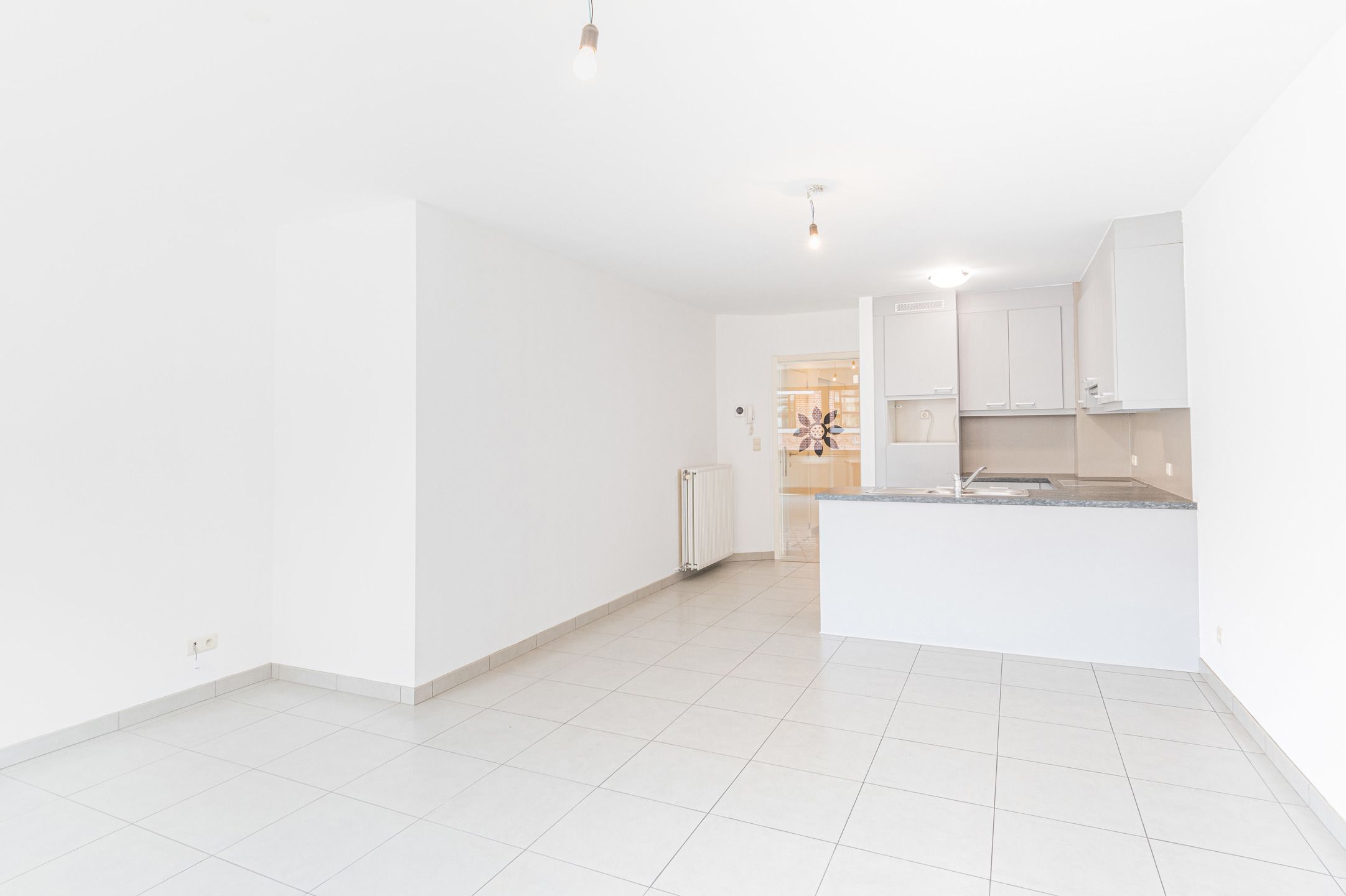 Gelijkvloers appartement met 2 slaapkamers! foto 3