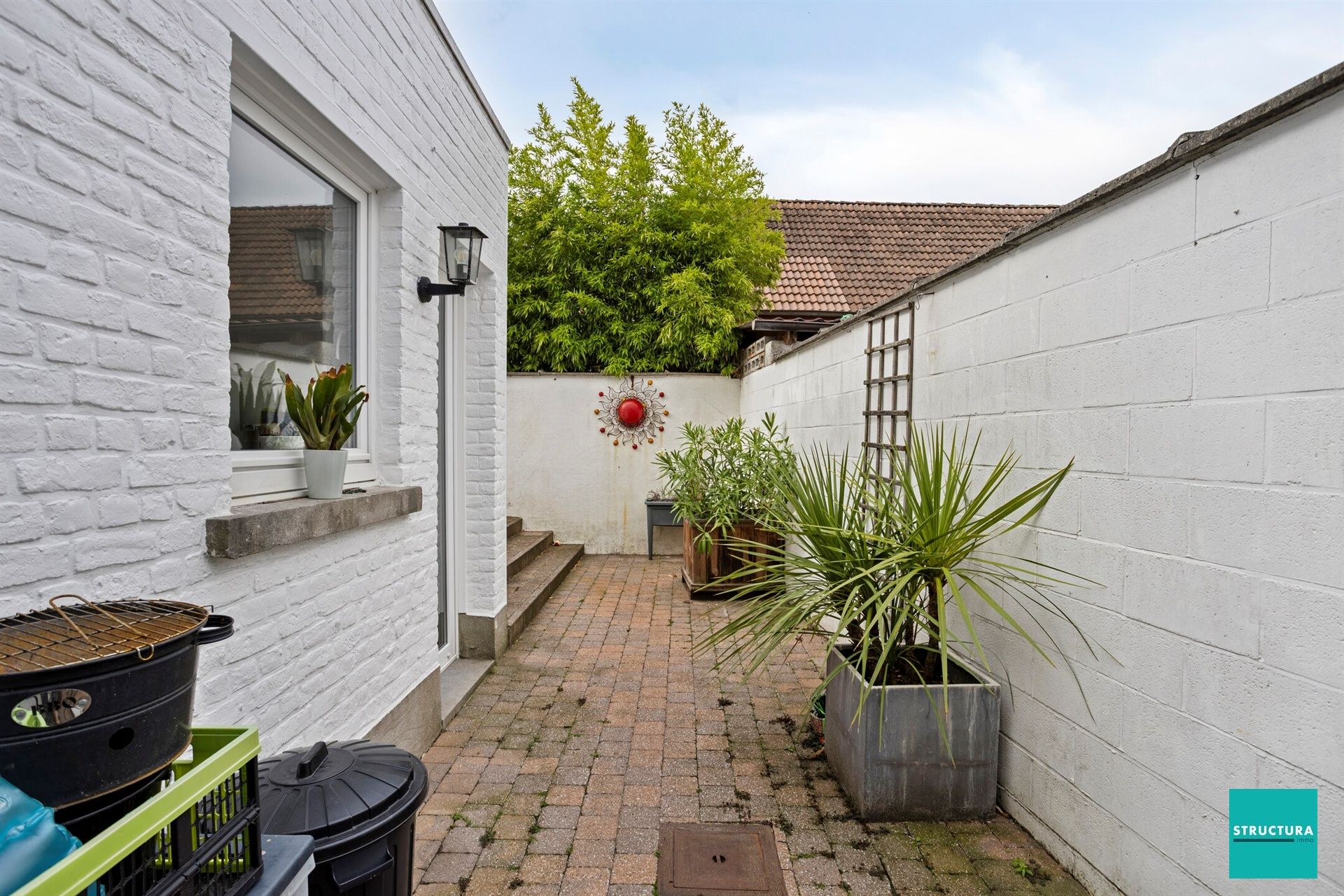 Instapklare rijwoning met stadskoer in hartje Merchtem foto 22