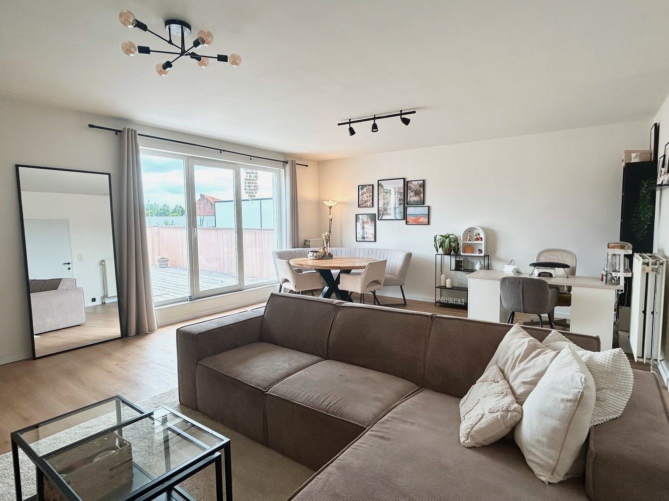 Ruim duplex appartement met dakterras en autostaanplaats te Wilsele foto {{pictureIndex}}