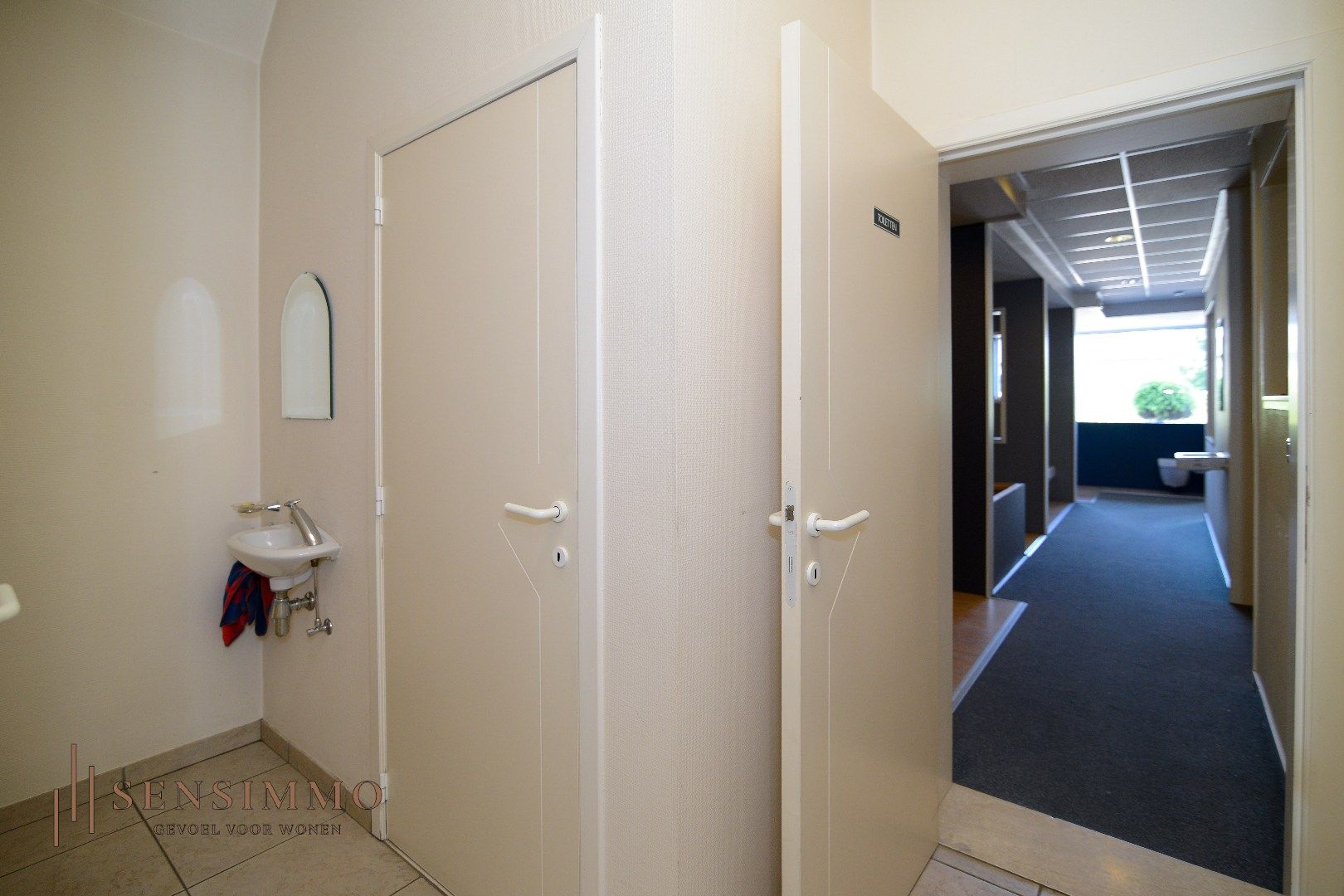 INVESTEERDERSOPPORTUNITEIT - GEBOUW MET TOONZAAL + 4 APPARTEMENTEN + MAGAZIJN + GARAGEBOXEN + BOUWGROND foto 10