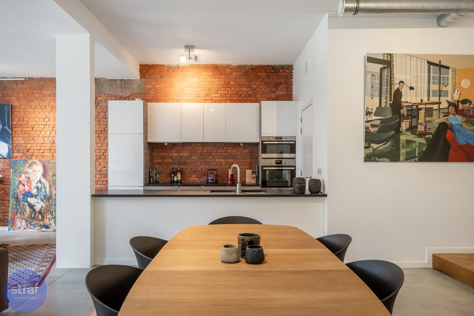 Moderne loft met open leefruimte en gezellige stadstuin in Berchem foto 9