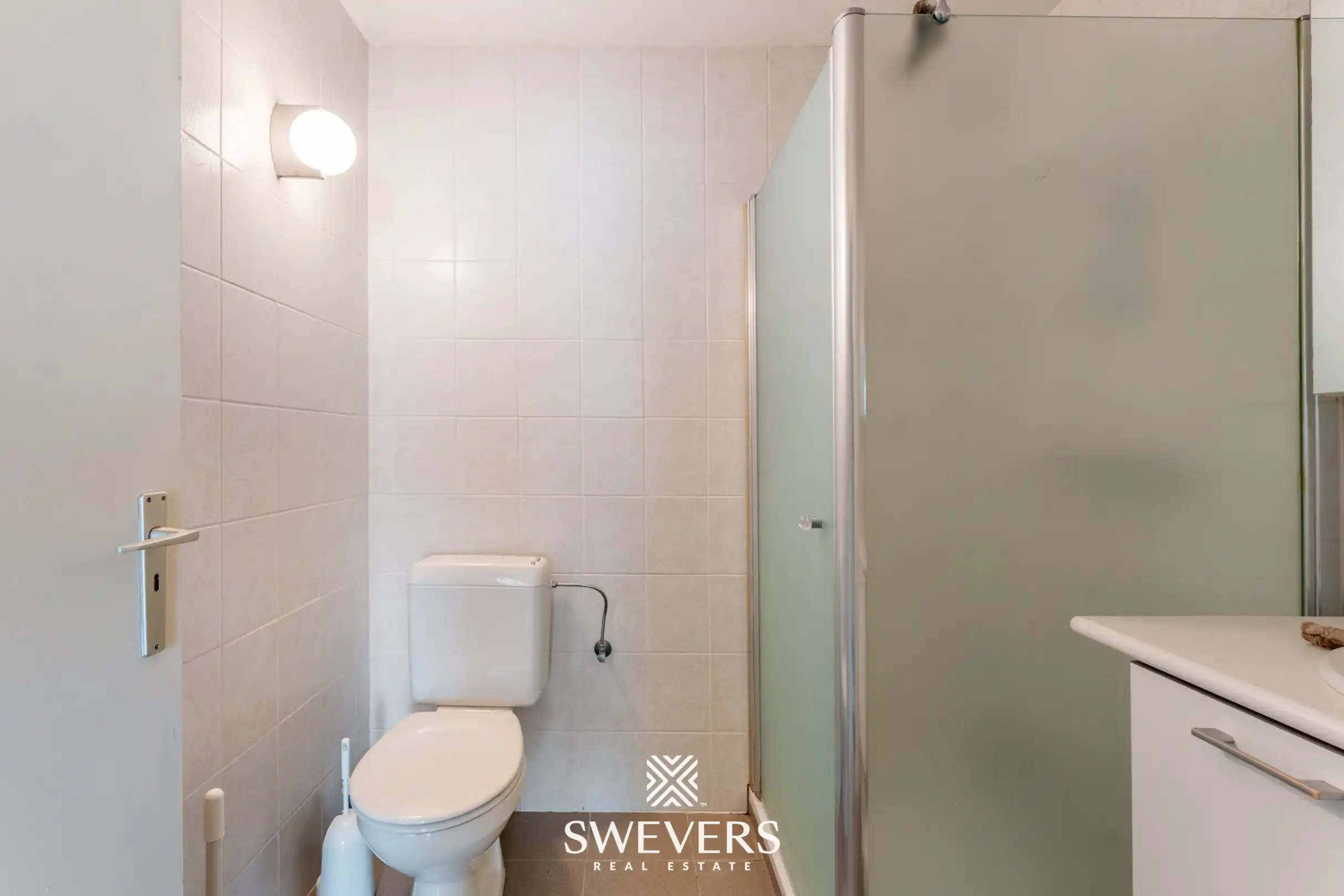 Ruim gelijkvloers 3-slaapkamerappartement inclusief autostaanplaats en kelderberging nabij Hasselt-centrum foto 18