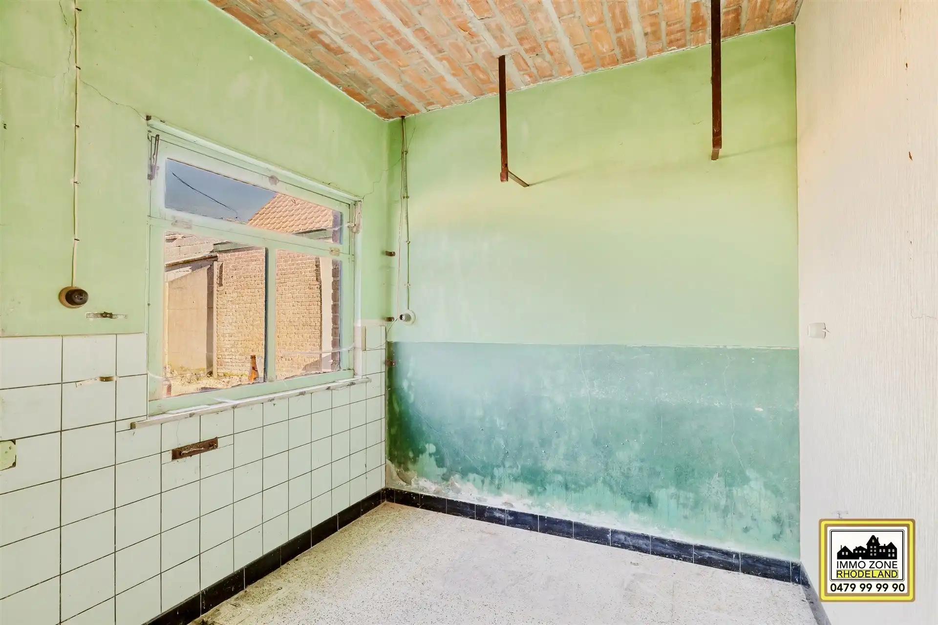 Gunstig gelegen te renoveren woning met 3 slpks en tuin foto 9