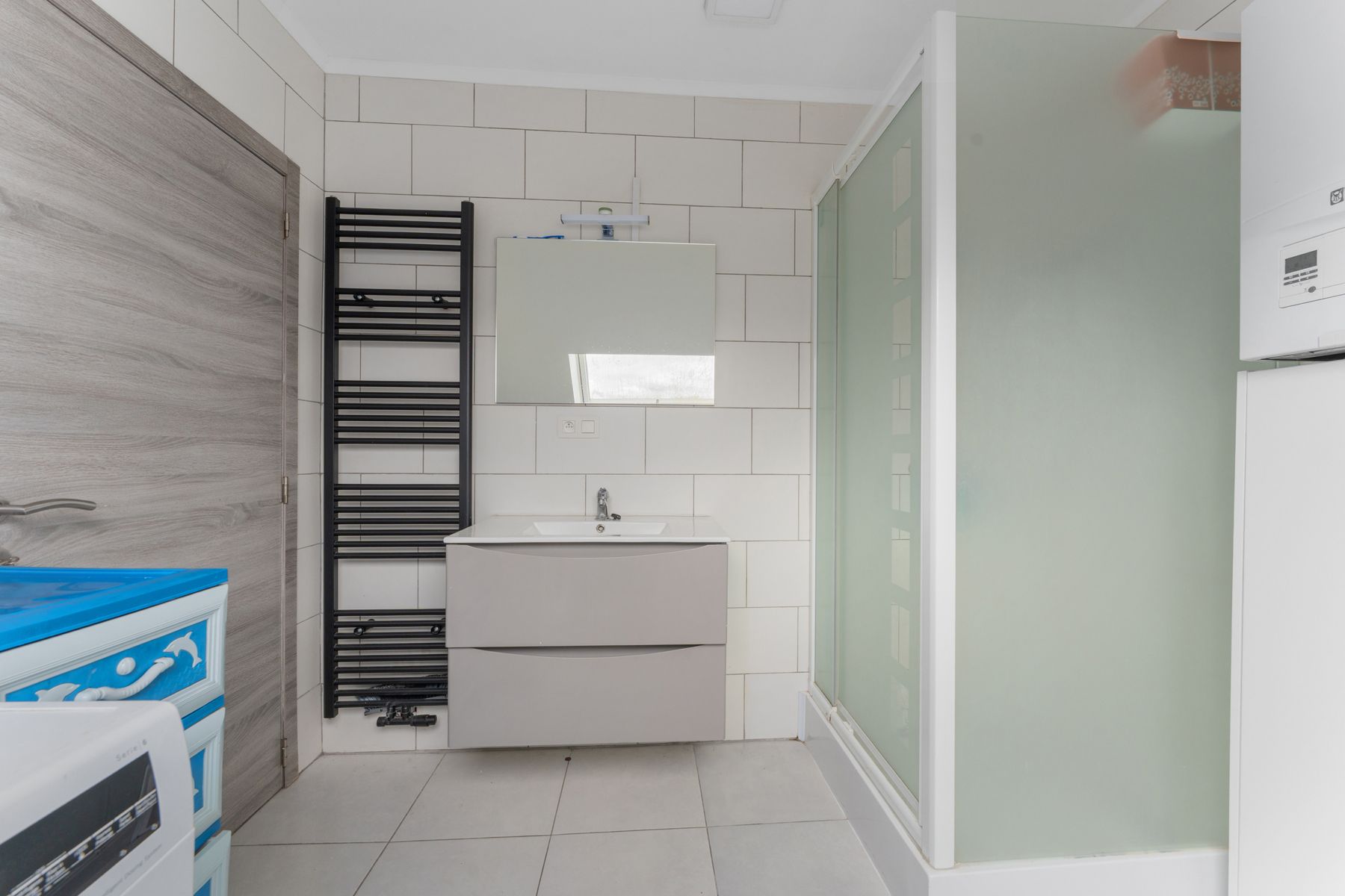 Vernieuwde woning met 3 slaapkamers te koop in Gent foto 11