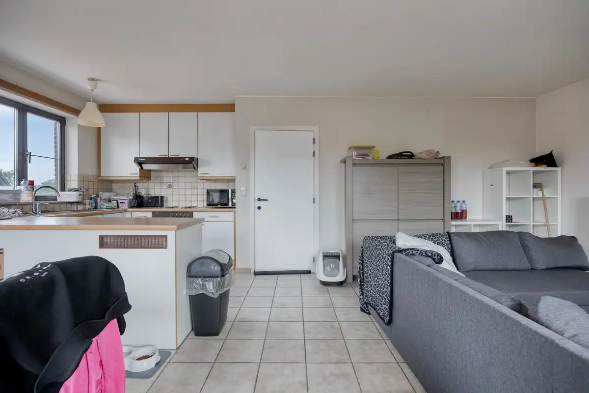 Opbrengsteigendom met 3 appartementen en 7 garages foto 16