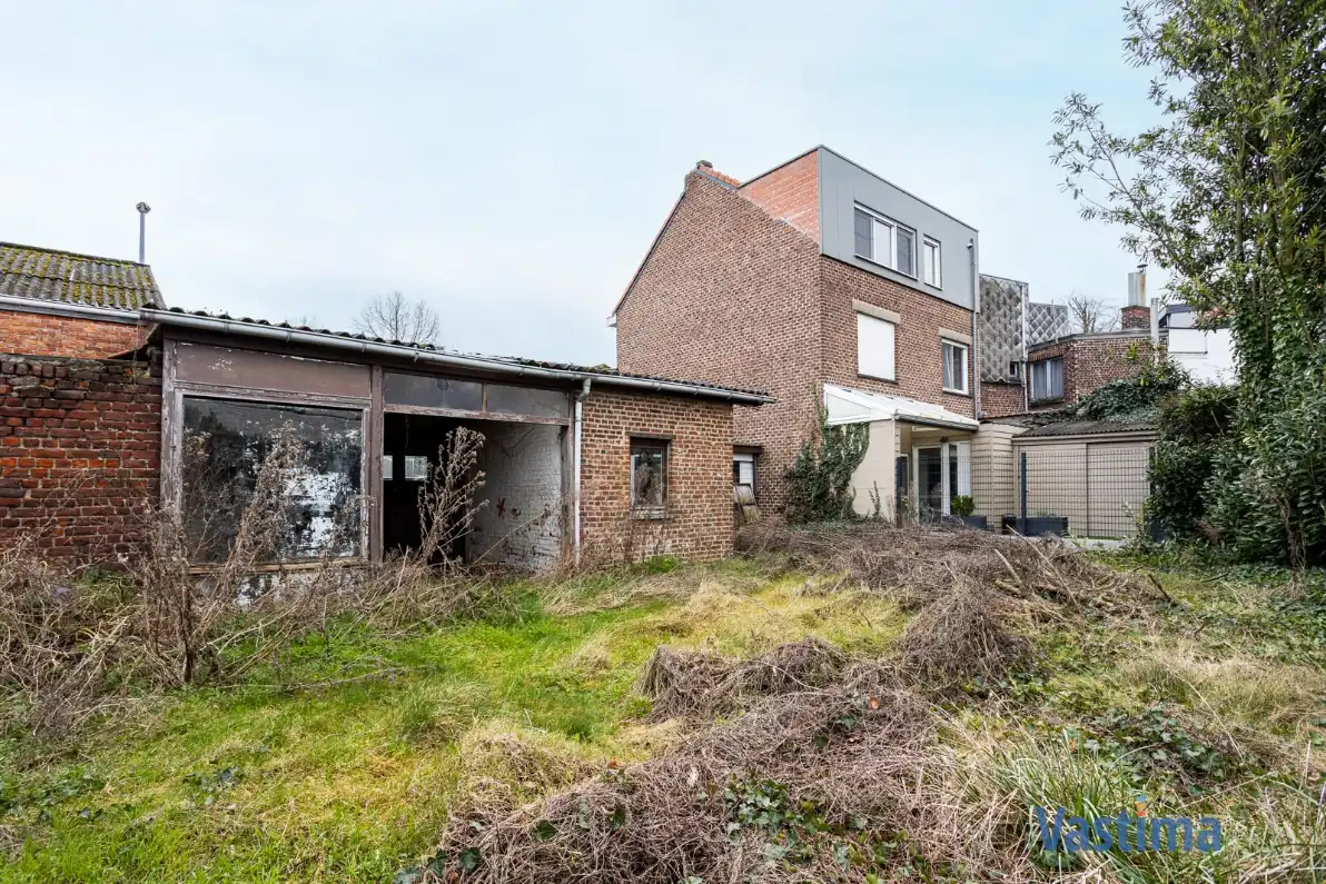 Unieke grond in het hart van Merchtem foto 13