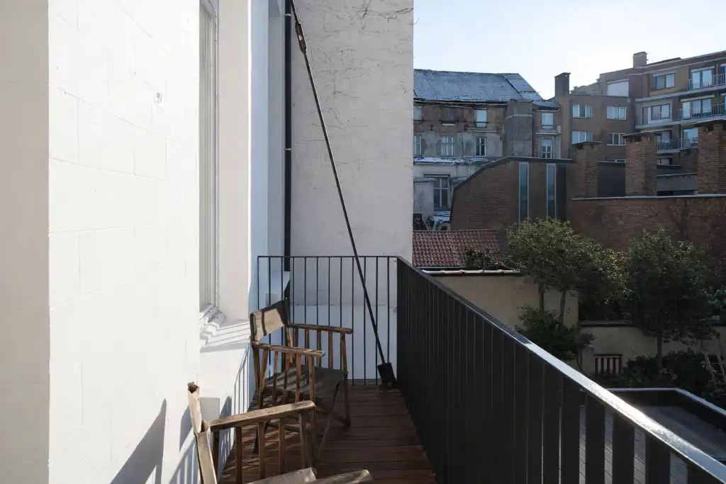 Gerenoveerd tweeslaapkamerappartement met zonnig terras in een voormalige herenwoning, nabij het historisch centrum van Gent. foto 13