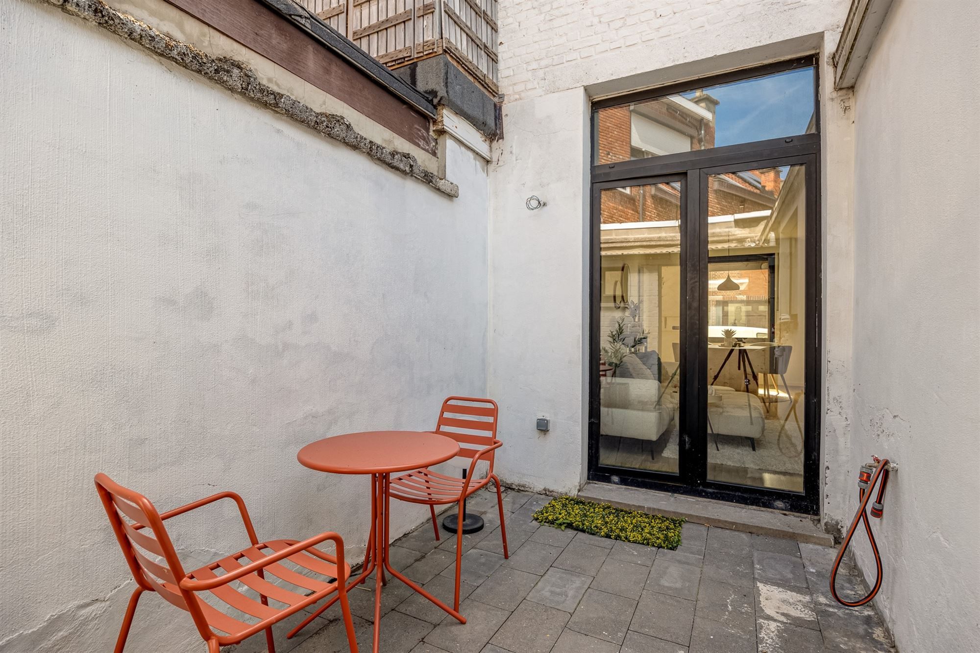 Instapklare woning met 3 slaapkamers en stadskoer foto 6