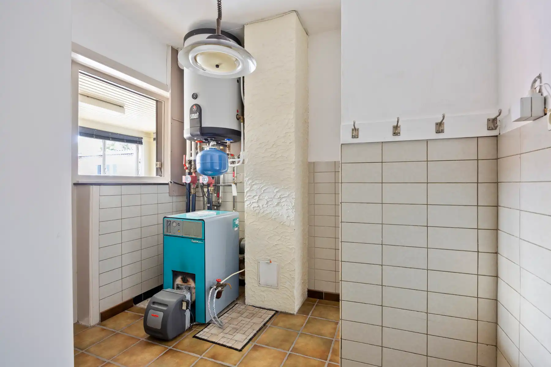 Woning met renovatiepotentieel in het centrum van Hechtel! foto 12