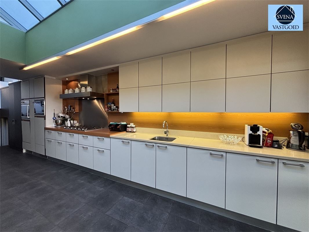 WONING MET HANDELSRUIMTE IN HET CENTRUM VAN GERAARDSBERGEN foto 6