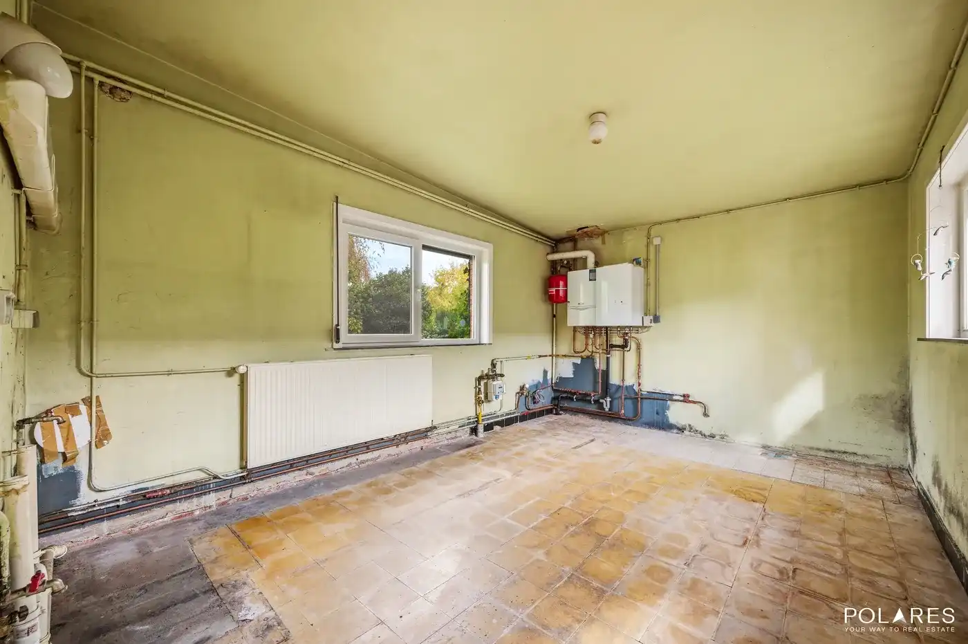 Op te frissen open bebouwing met 4 slaapkamers, groene tuin en garage in Werchter foto 7