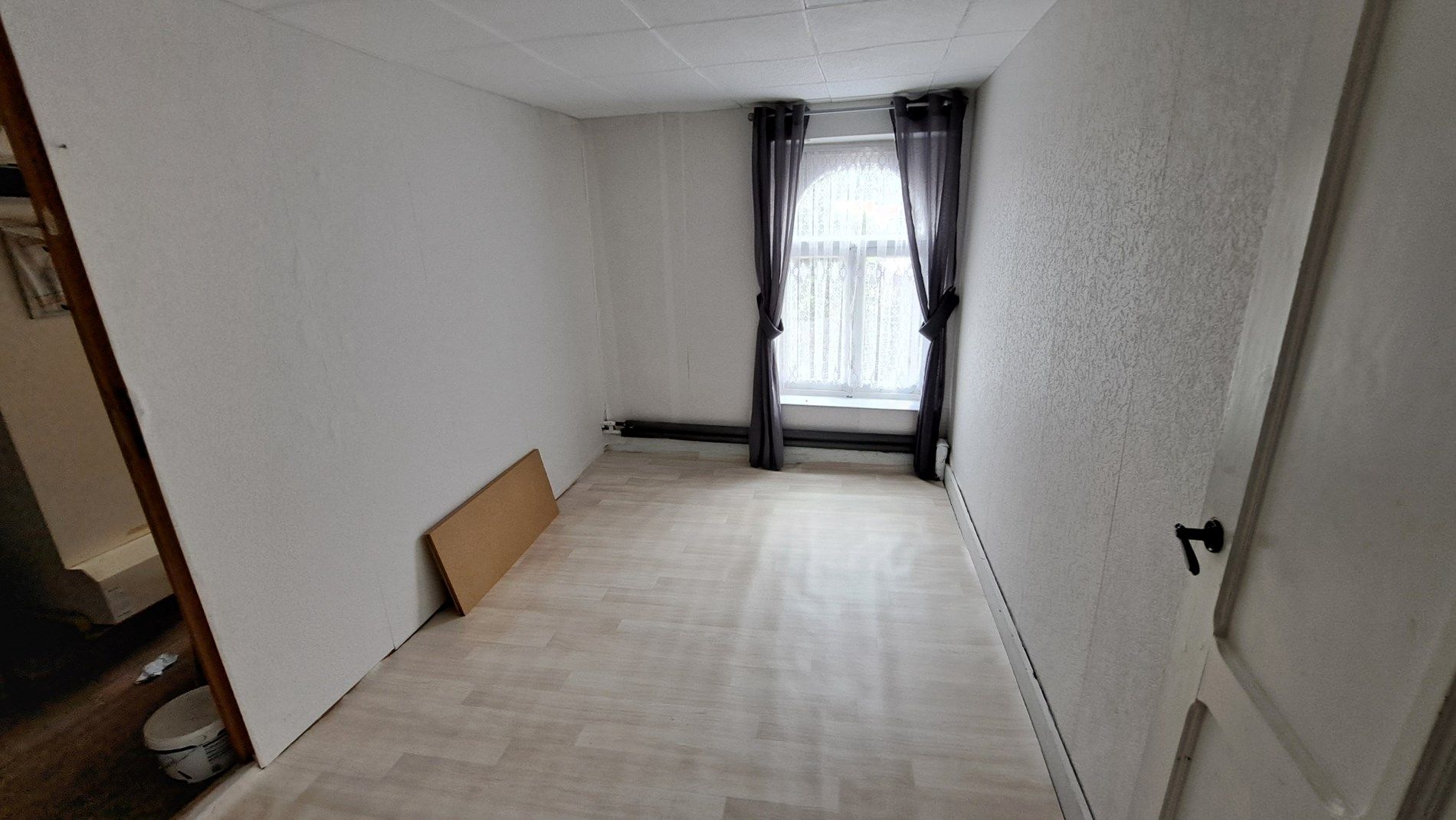 Te renoveren ruime woning met 3 slaapkamers en binnenkoer foto 15