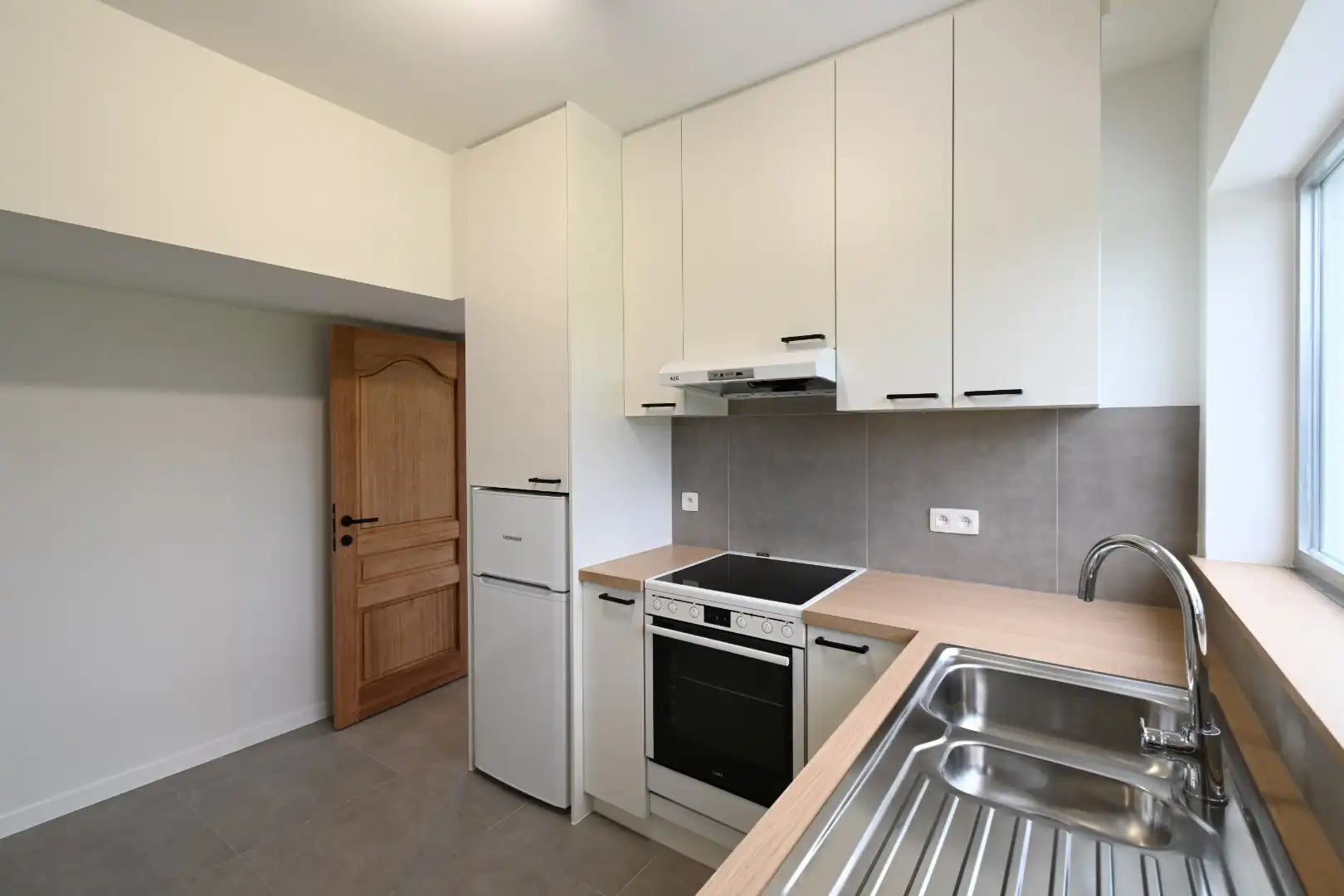 Zorgvuldig gerenoveerde vrijstaande woning met veranda en leuke tuin op 5a24ca te Munsterbilzen foto 12