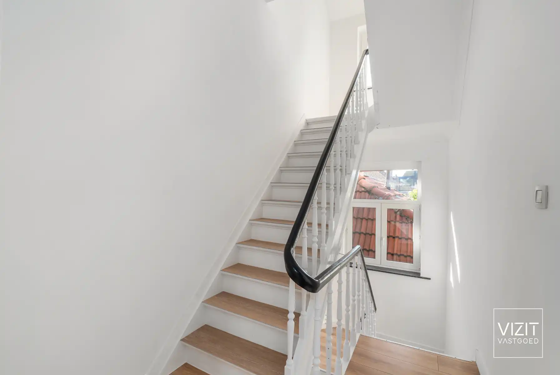 Volledig gerenoveerde woning met stadstuin foto 9