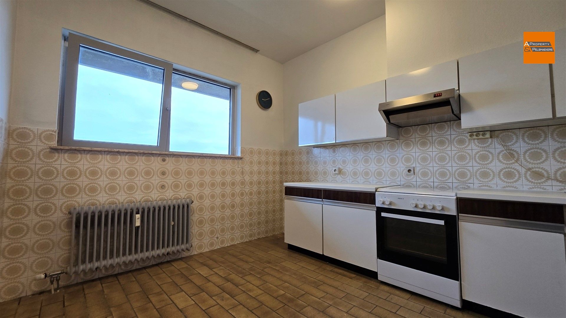 Ruim en lichtrijk appartement met terras en garagebox te huur in Herent foto 7