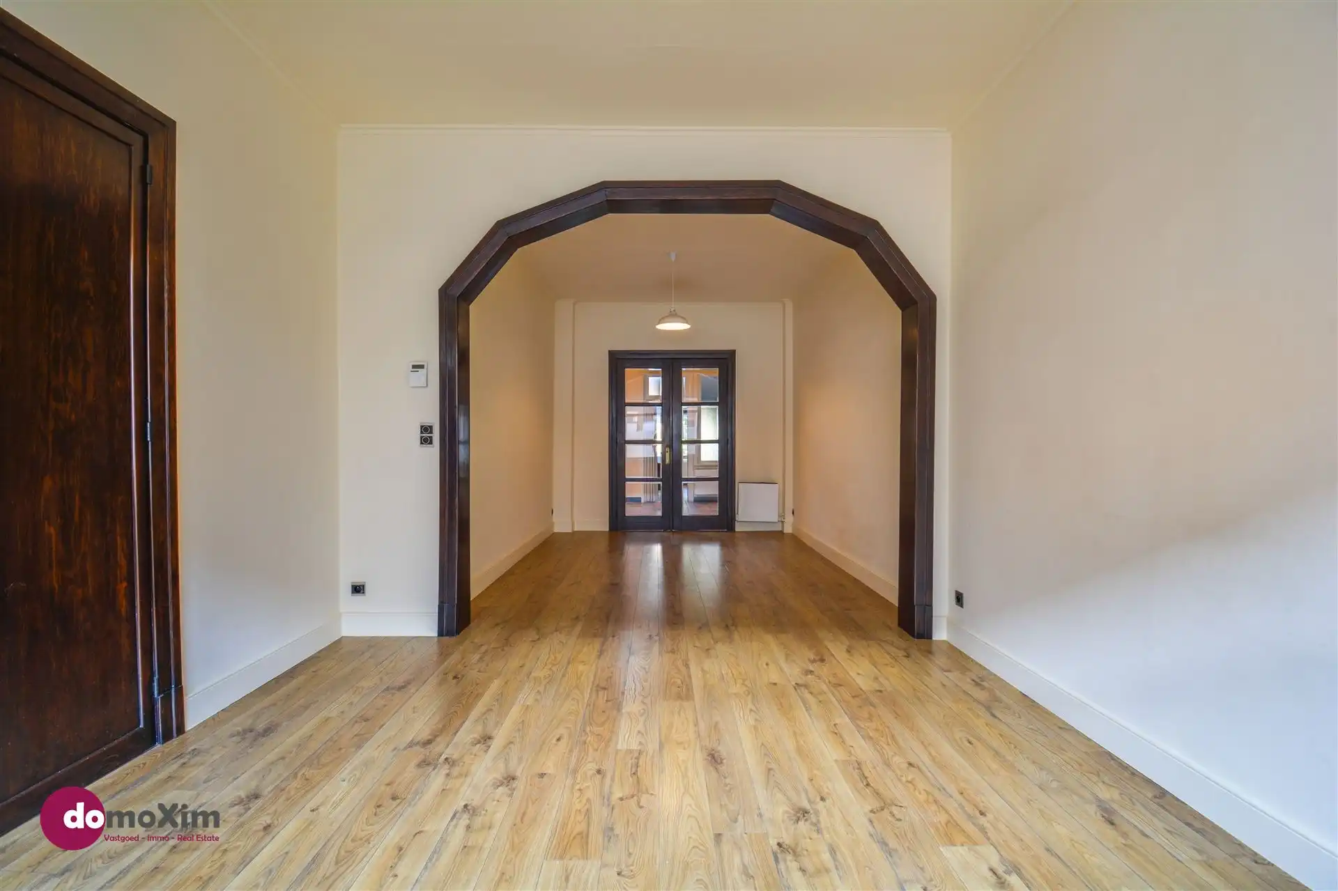 Ruime, karaktervolle stadswoning met twee garageboxen en tuin in Mechelen foto 2