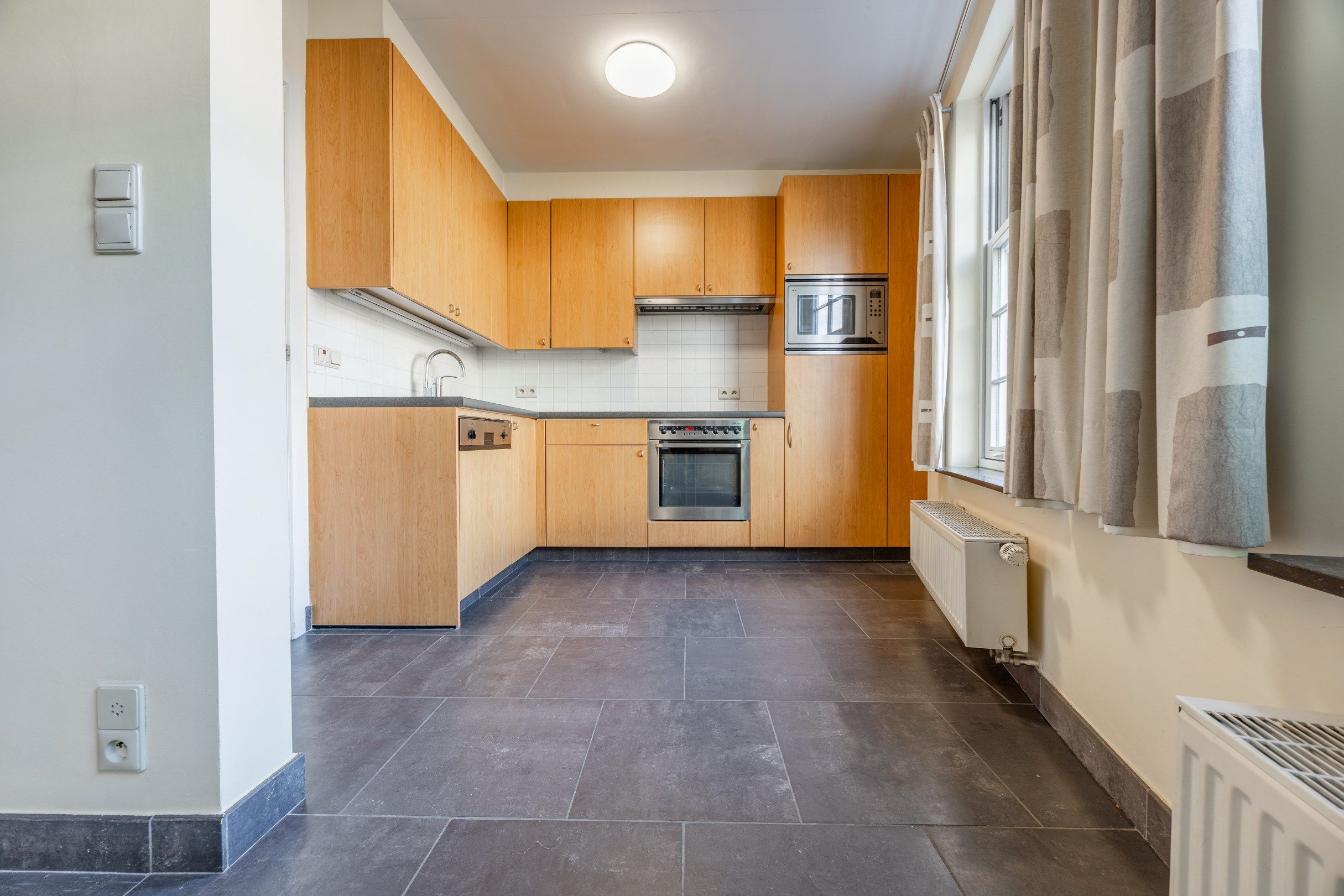 INSTAPKLAAR APPARTEMENT MET ZONNIG TERRAS foto 7