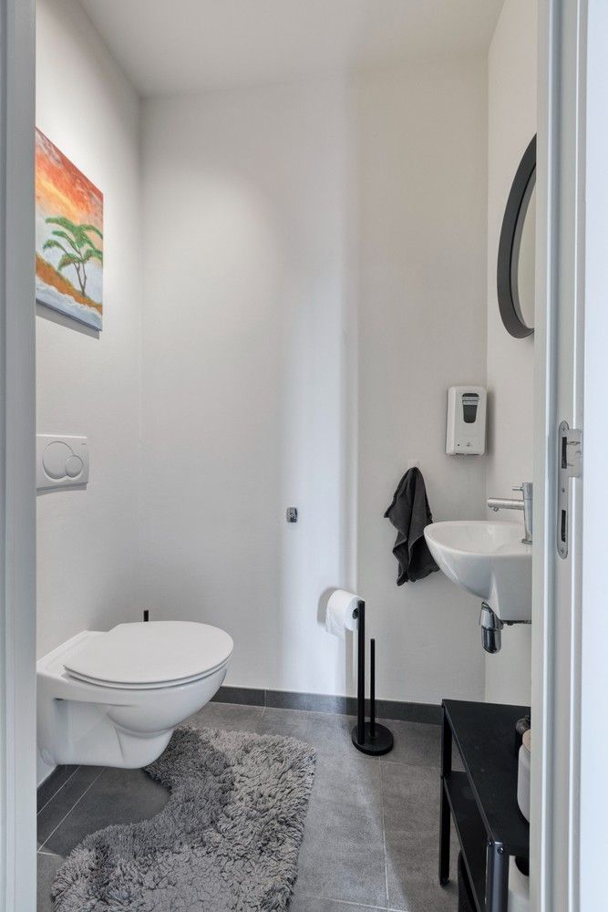 Instapklare en lichtrijke duplex met terras, garage én drie slaapkamers foto 6