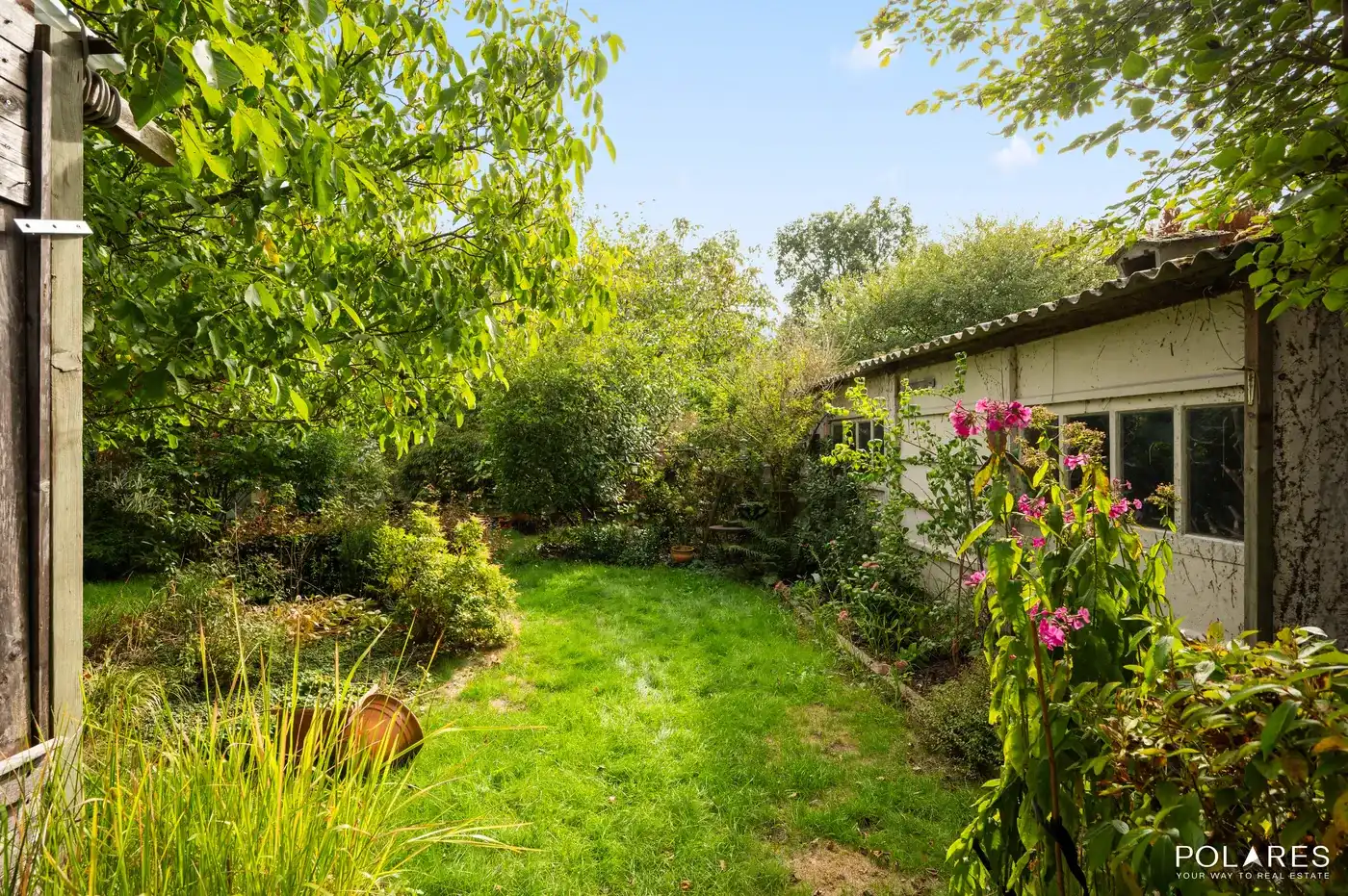 Op te frissen open bebouwing met 4 slaapkamers, groene tuin en garage in Werchter foto 16