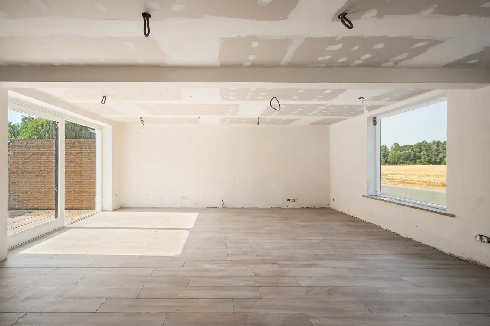 Ruime halfopen woning met 5 slaapkamers, grote tuin en prachtig open zicht in Lapscheure. foto 5