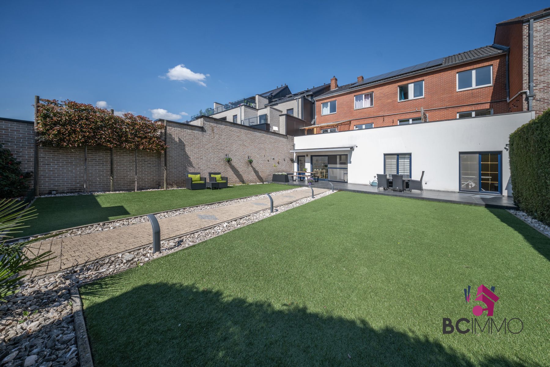 Instapklaar gelijkvloers appartement met tuin, dubbele garage en staanplaatsen te Genk foto 21