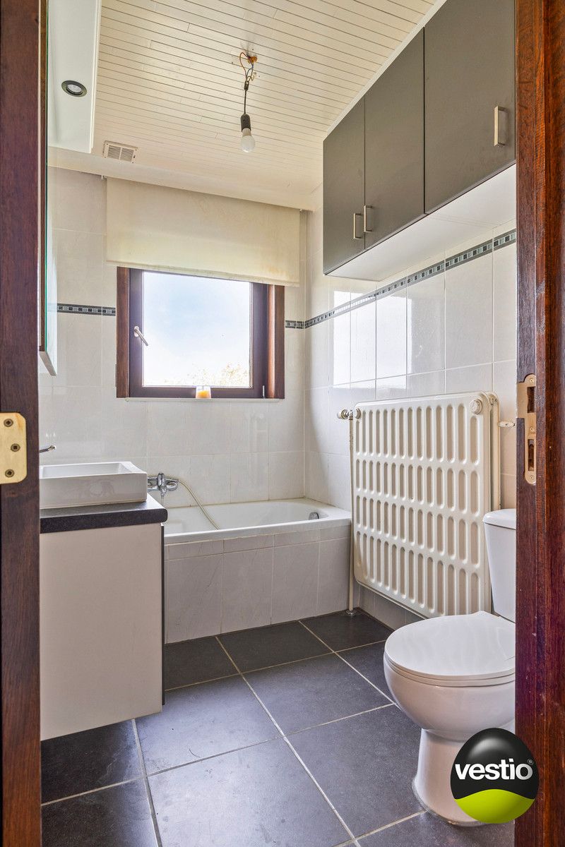 RUSTIG GELEGEN SPLIT LEVEL WONING OP 21A10CA TE KORTESSEM. foto 22