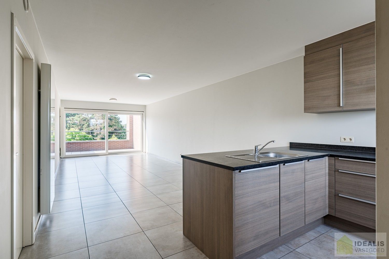 IDEALIS VASTGOED - INSTAPKLAAR APPARTEMENT MET 2 SLAAPKAMERS, AANGENAME LEEFRUIMTE MET AANSLUITEND TERRAS, ONDERGRONDSE PARKEERPLAATS EN BERGRUIMTE. Zeer geschikt voor kandidaten op zoek naar betaalbare woonruimte in nieuwstaat vlak bij de stadskern van Bree! foto 10