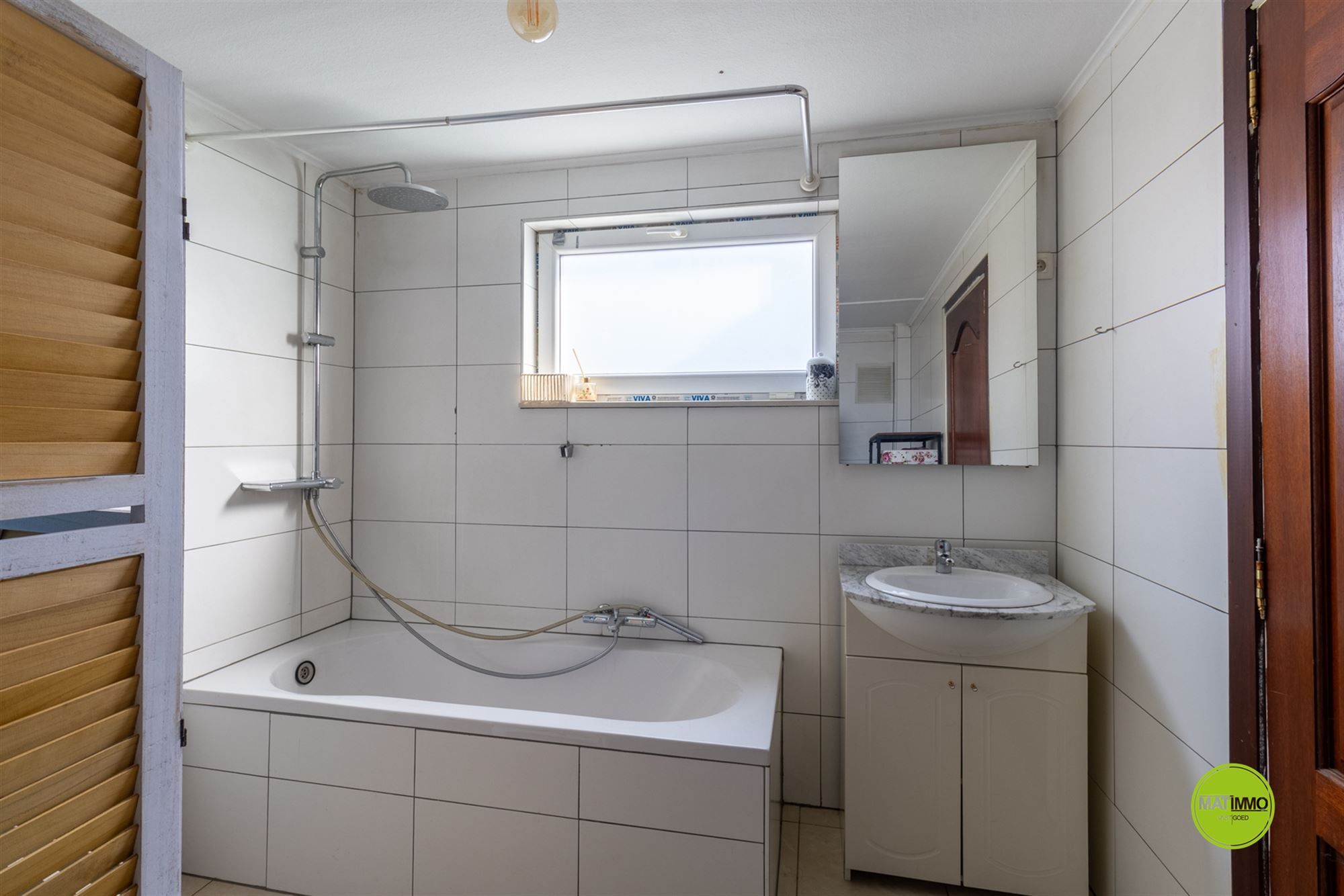 Handelshuis met woonruimte in hartje Beverlo foto 14