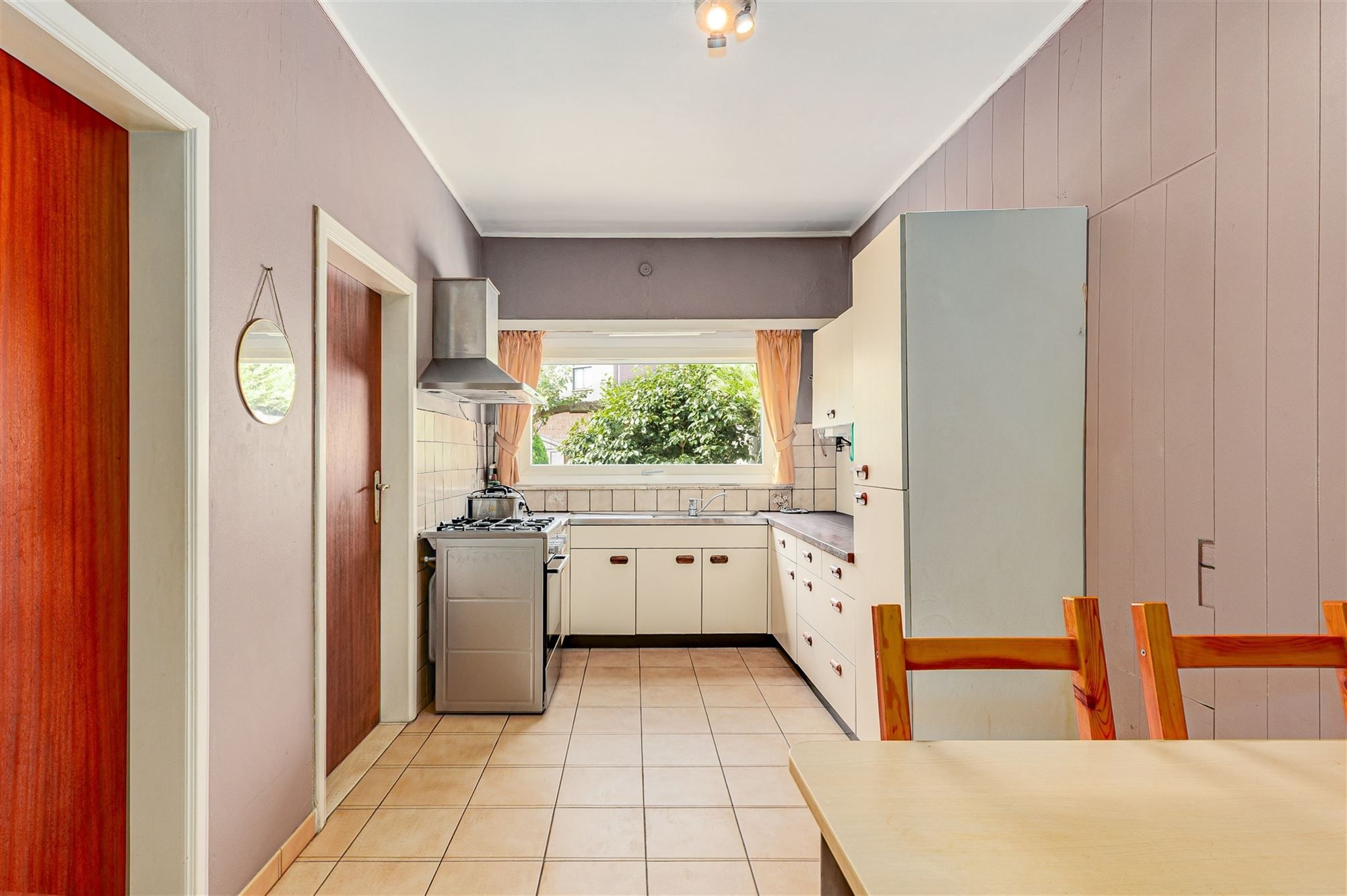 Te renoveren woning met 3 slpk, terras en ruime tuin in Wommelgem! foto 5