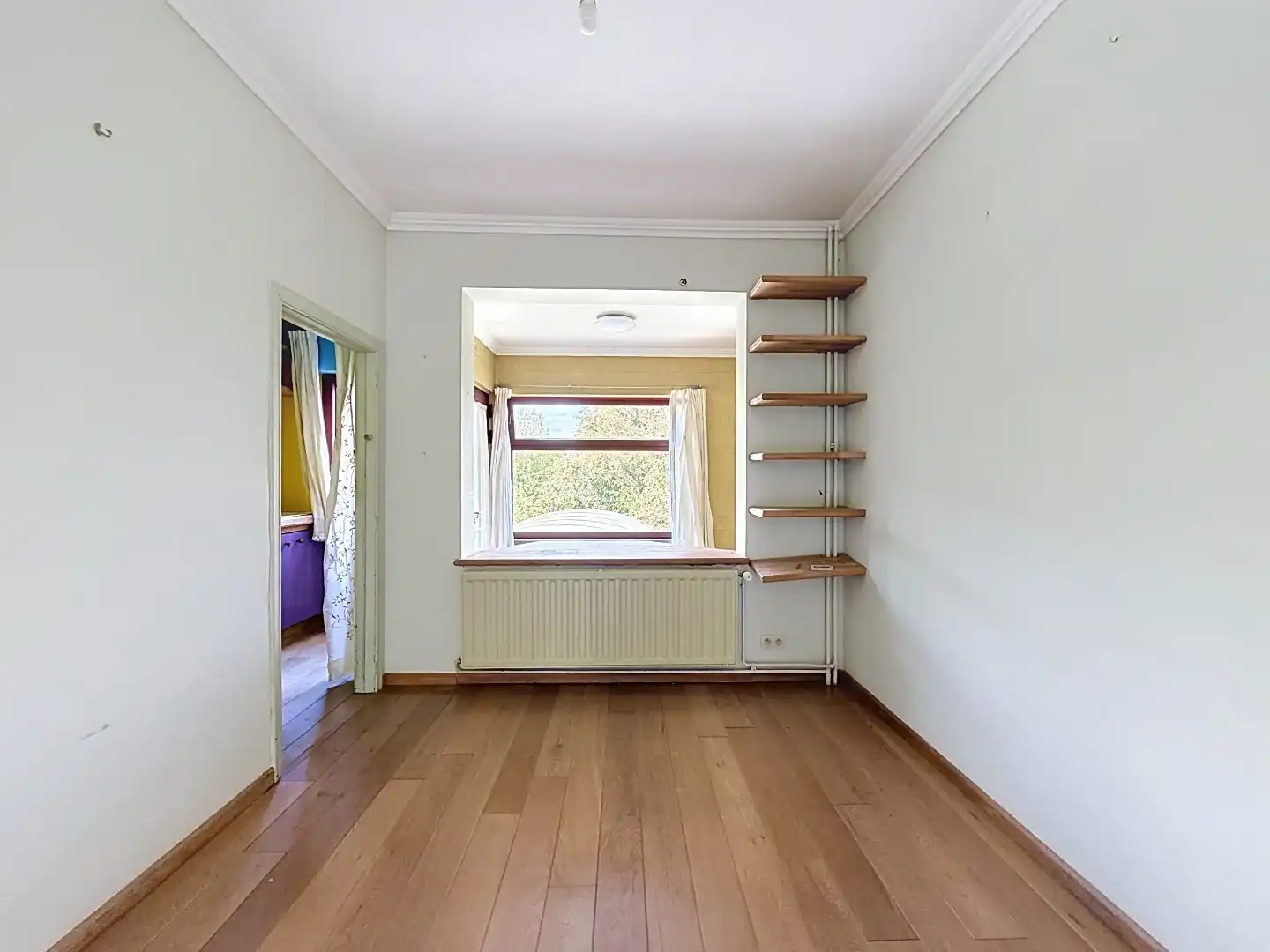 Ruime bel-etagewoning met 4 slaapkamers en grote zuidoostgerichte tuin in Leuven foto 7