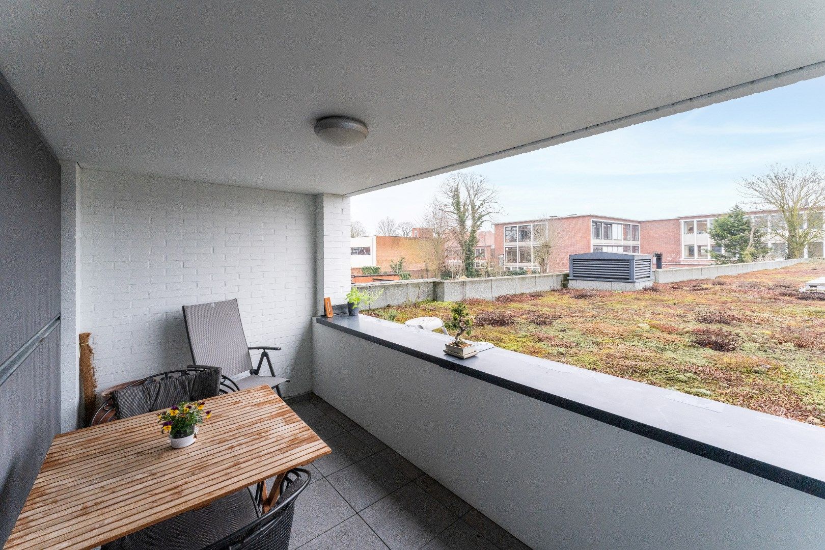 Ruim appartement met terras en 2 slaapkamers in Izegem, bouwjaar 2009, EPC-waarde 102.00, energielabel B, oostelijke tuinoriëntatie foto 14