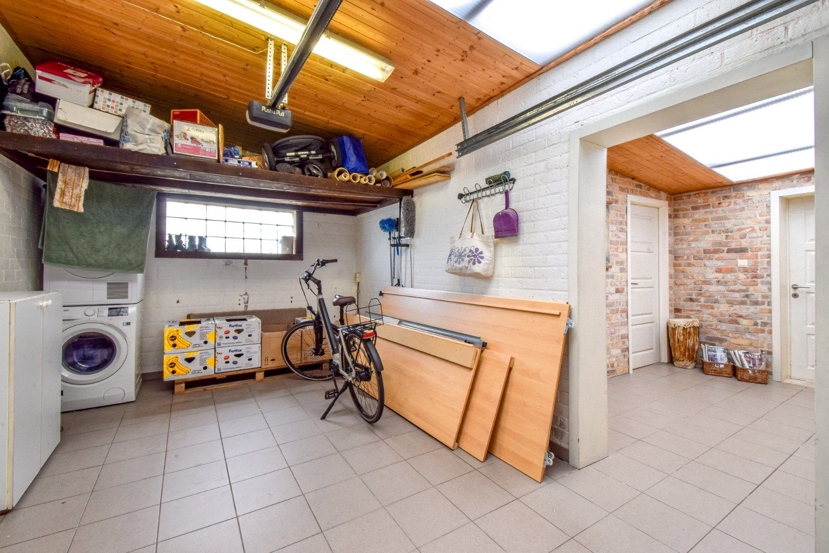 Rustig gelegen halfopen gezinswoning met ruime tuin en garage foto 19