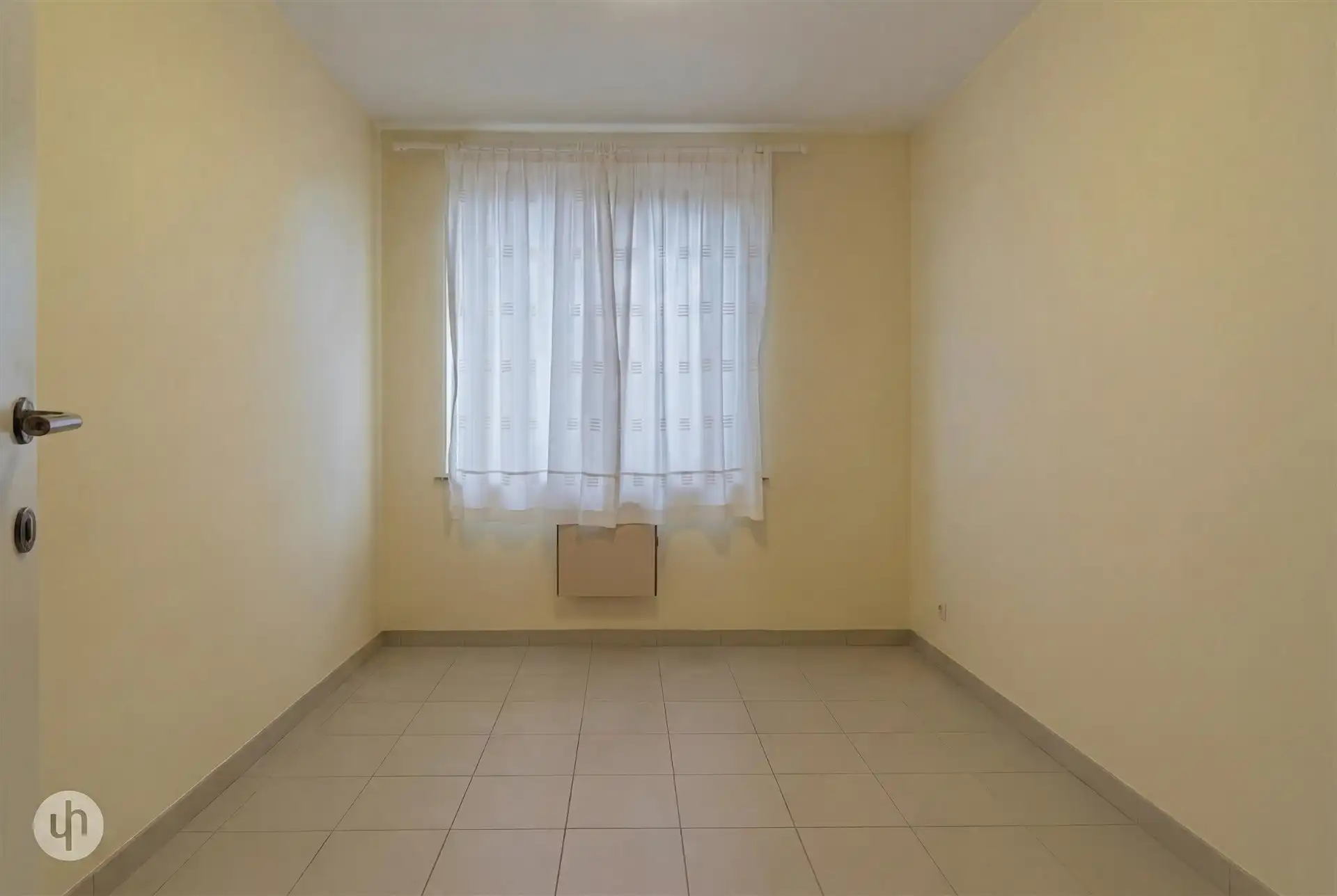 Gelijkvloersappartement met drie slaapkamers en garage foto 7