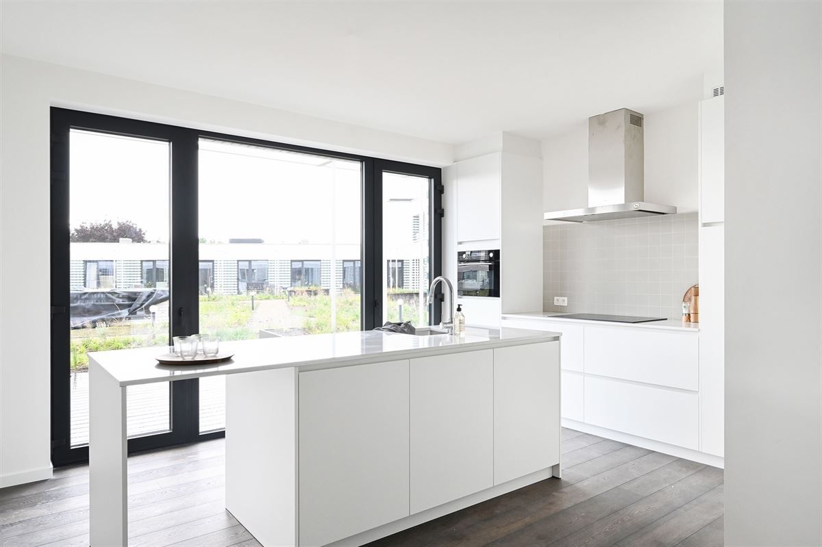 Ruim 1 slaapkamerappartement met groot terras in project Zilverkwartier te Berchem foto 3