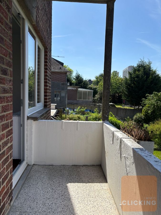 Tof 2 slaapkamer appartement met 2 parkeerplaatsen en ruime tuin foto 9