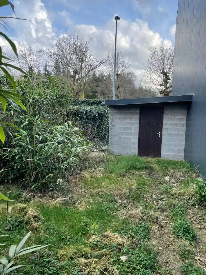 EENGEZINSWONING + GARAGE & TUIN foto 12