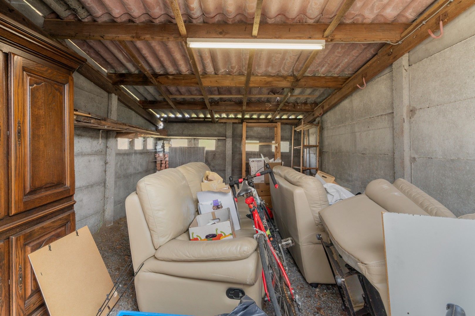 Halfopen woning met tuin en garages in het centrum van Nevele! foto 20