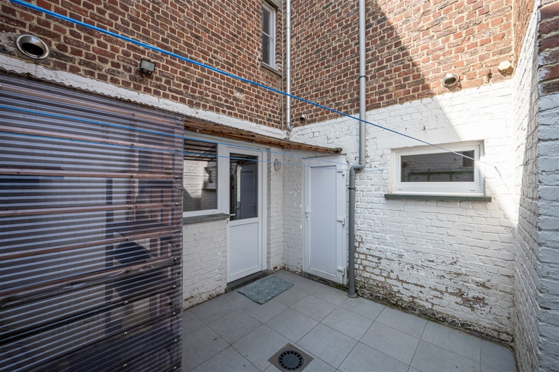 Instapklare woning met drie slaapkamers en koer te Hofstade foto 18