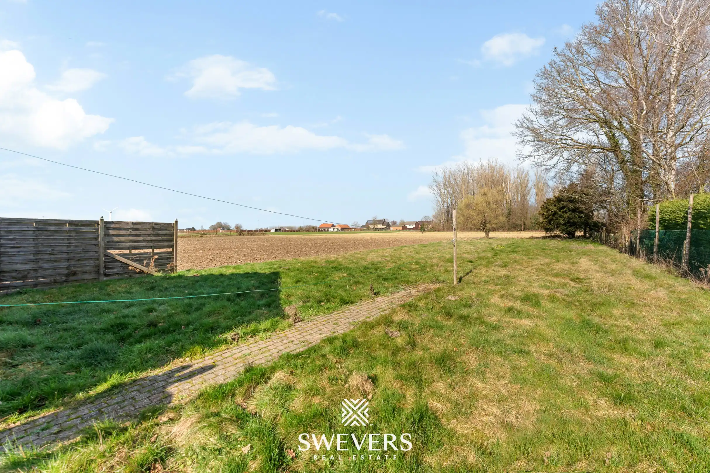 Te renoveren woning met 4 slaapkamers, grote tuin en omliggende velden op rustige ligging nabij centrum Diepenbeek foto 35
