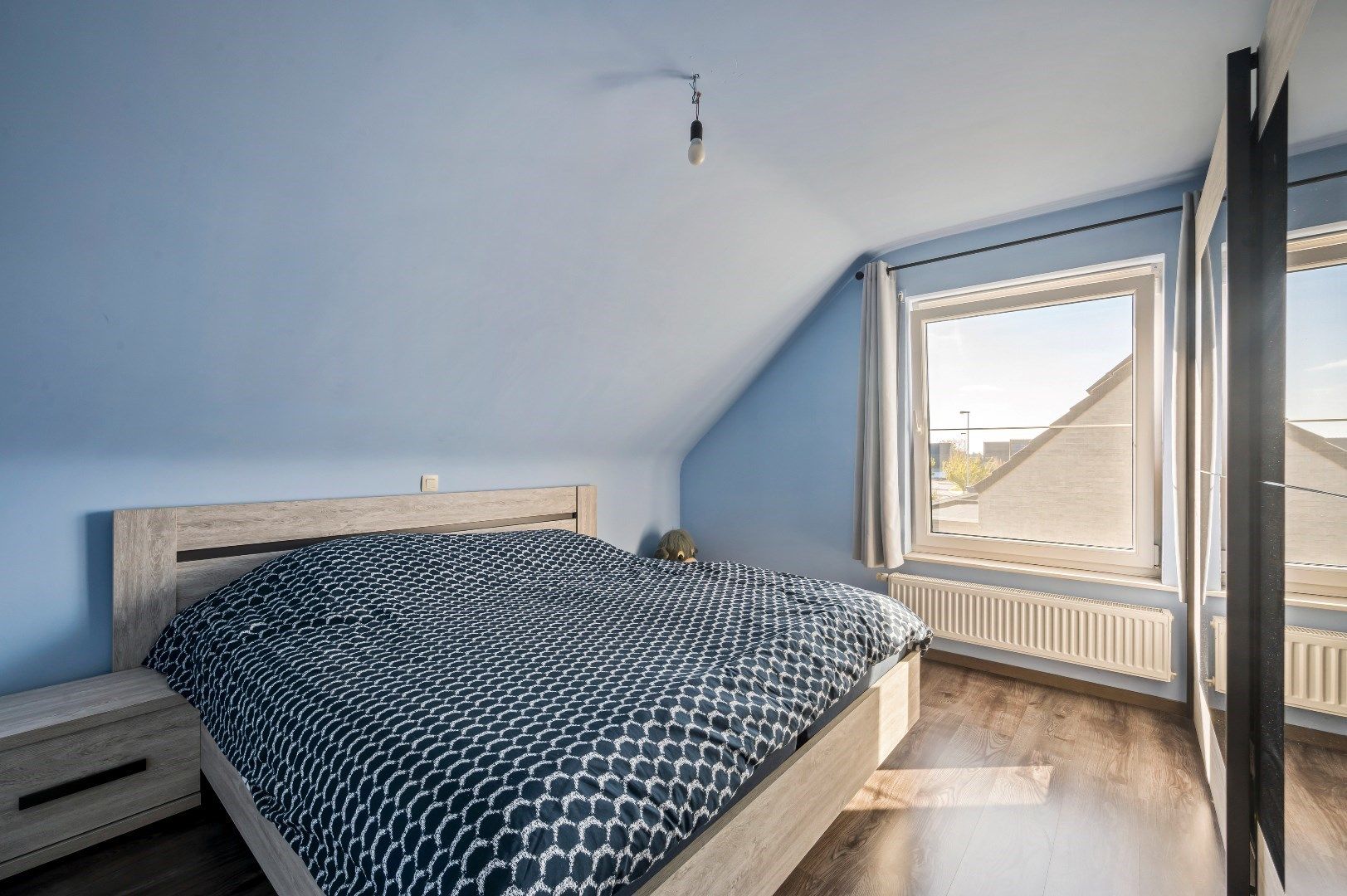 Centraal gelegen woning met 3 slaapkamers, garage en tuin. foto 10