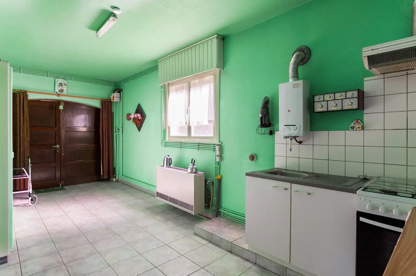 Vrijstaande, te renoveren woning met 3 à 4 slpk., garage en zuid-tuin foto 29