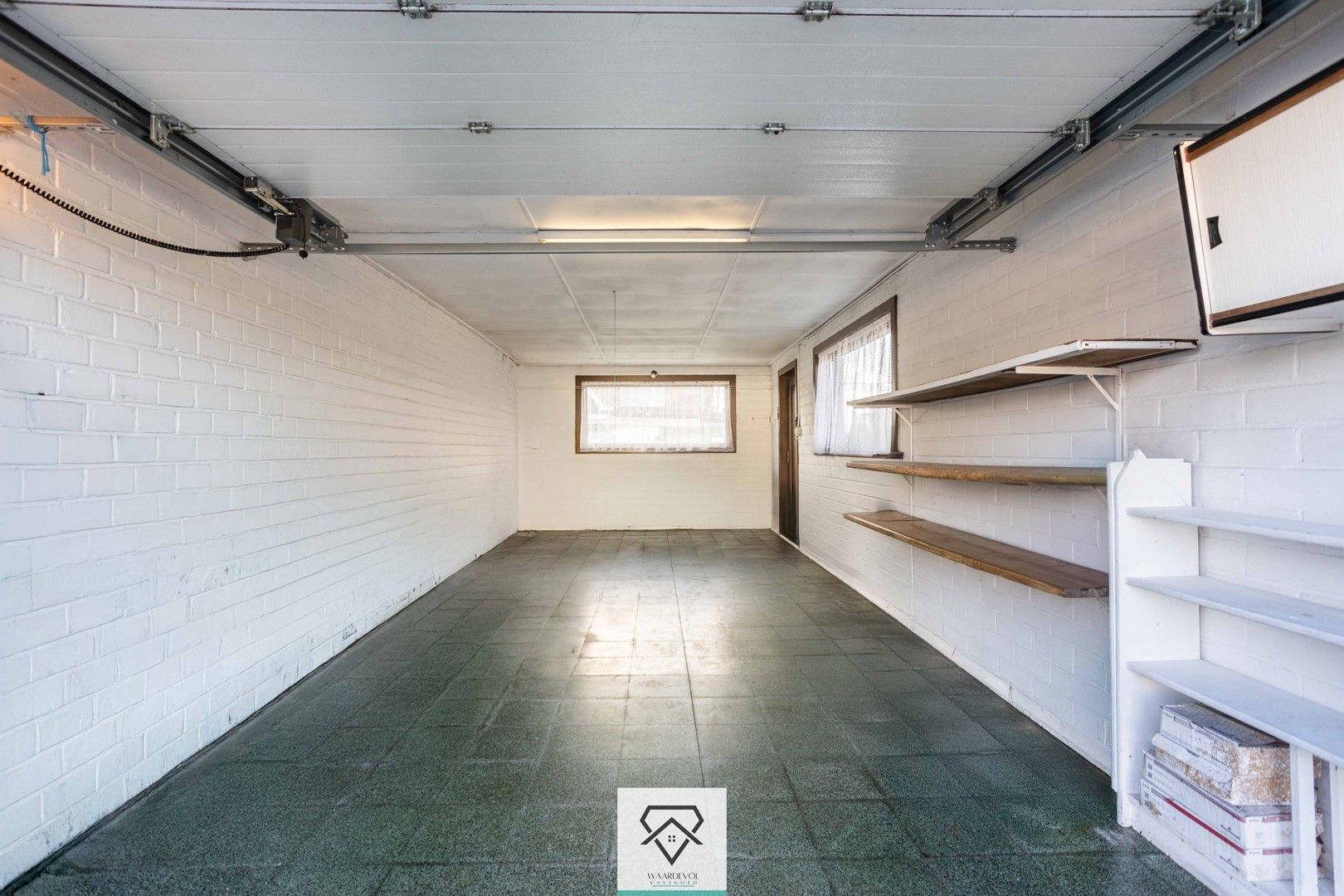 Instapklare woning met tuin en ruime garage te koop foto 25