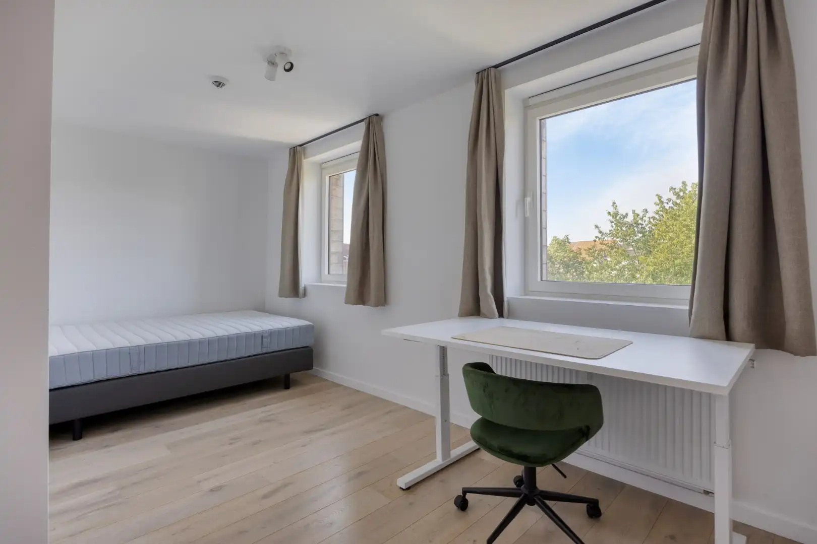 Studentenkamer van 18m² in prachtig gerenoveerde residentie met tuin in Heverlee  - 113 KWH/m foto {{pictureIndex}}