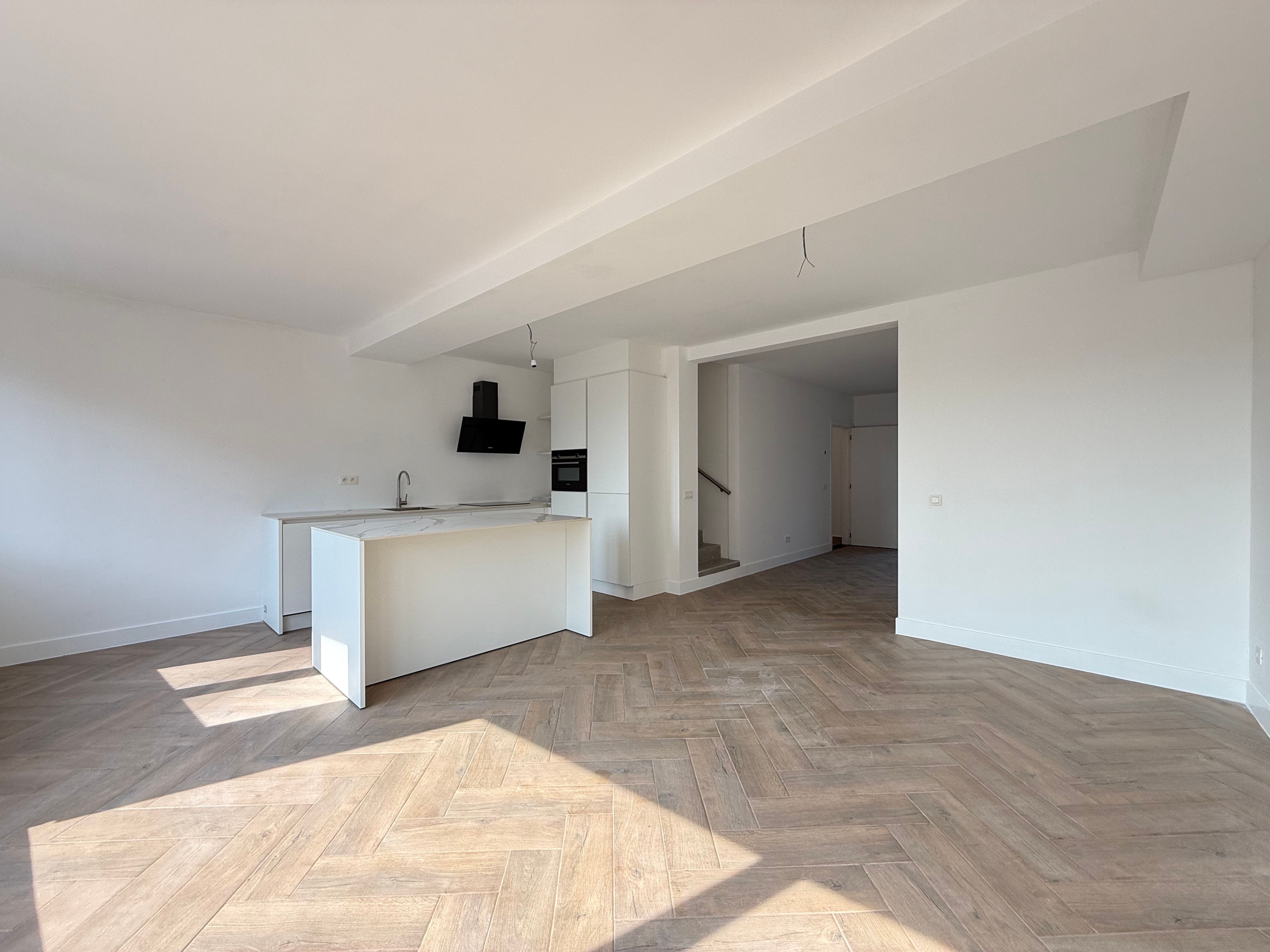 Schitterende duplex met 2 terrassen foto {{pictureIndex}}