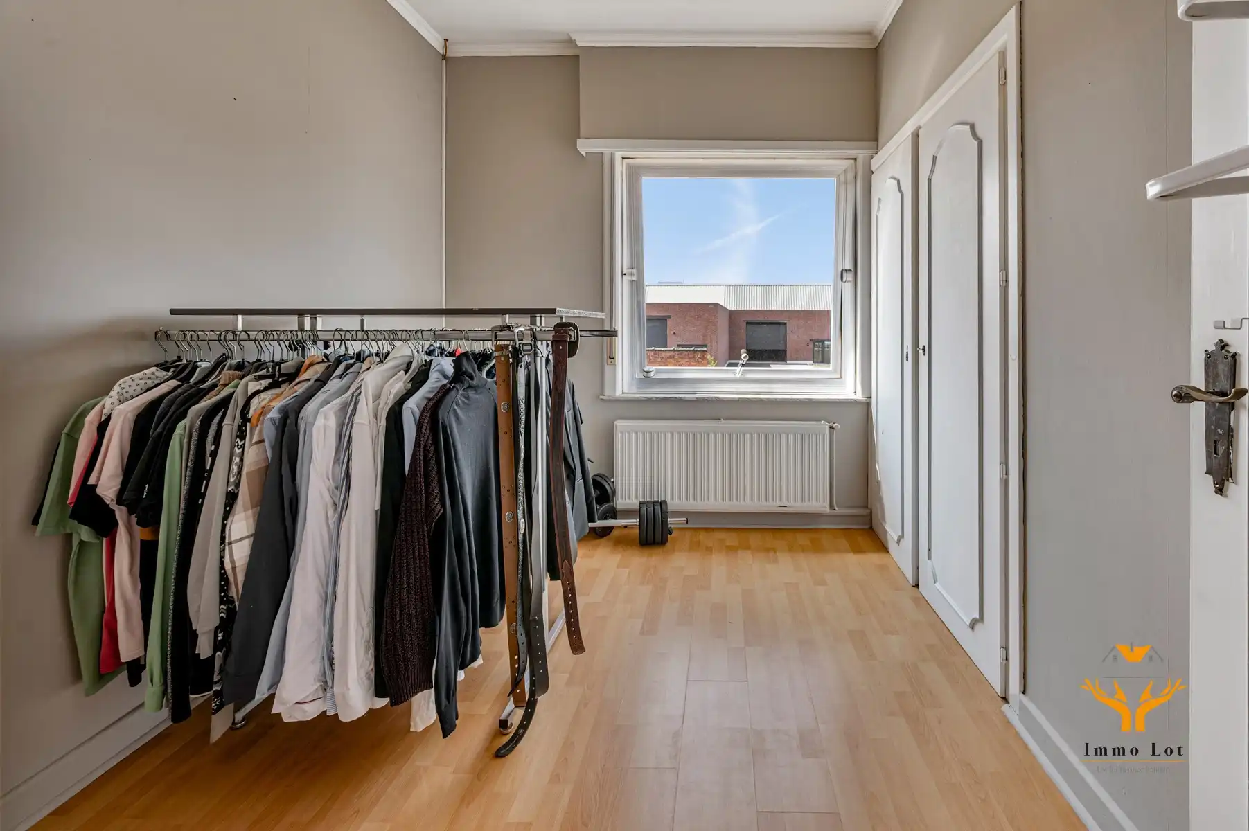 Halfopen bebouwing met tuin en garage in centrum Kalken foto 14