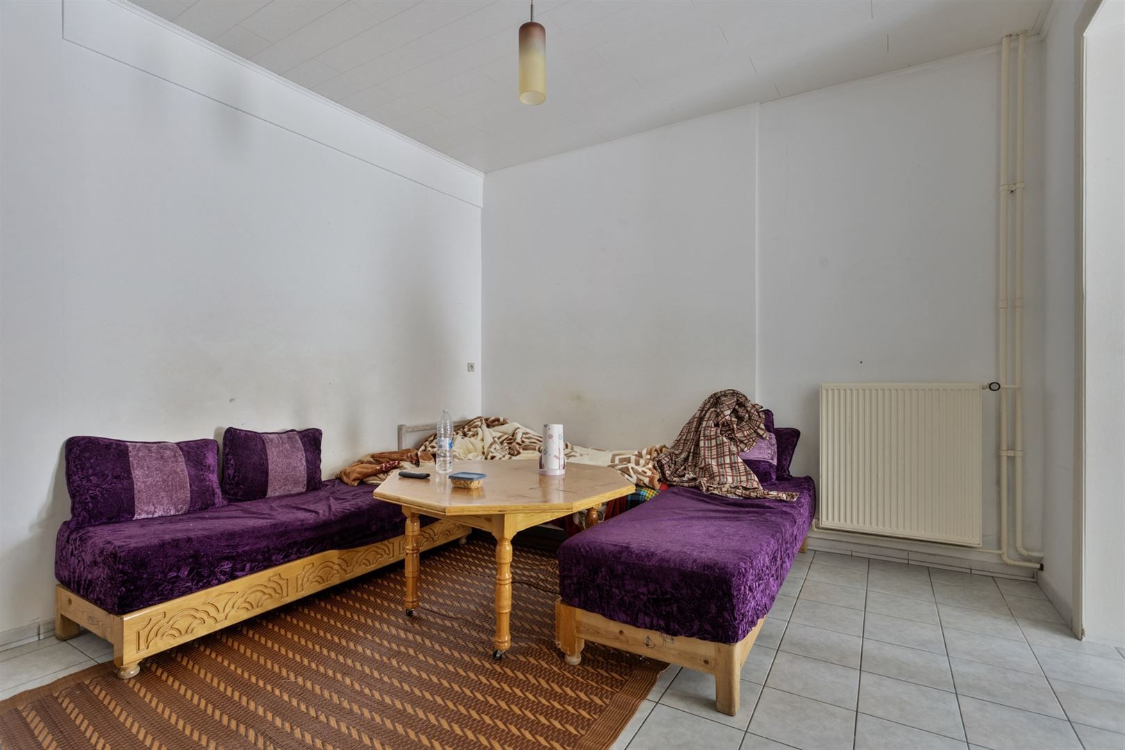 TE KOOP: Te renoveren woning op toplocatie in Hasselt! foto 3