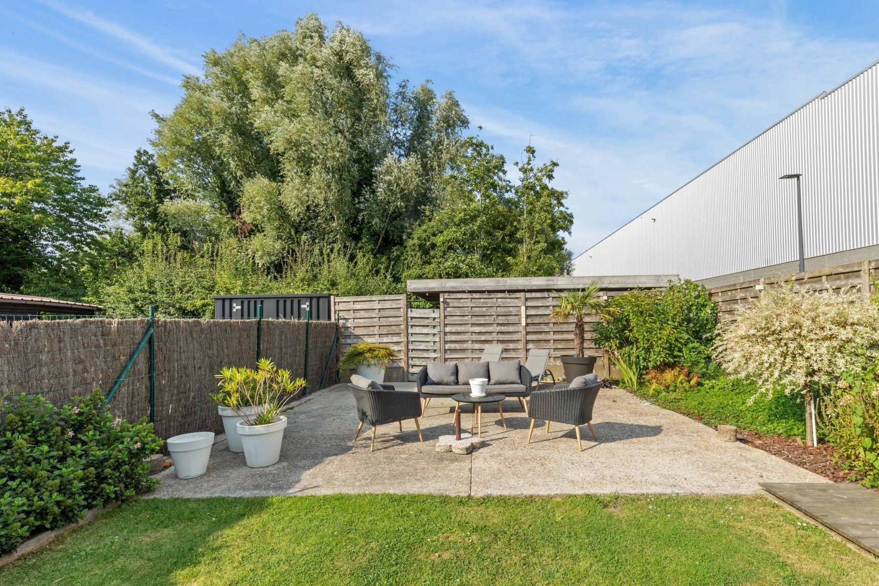 Charmante halfopen woning met ruime tuin, garage en duurzaam watergebruik! foto 20