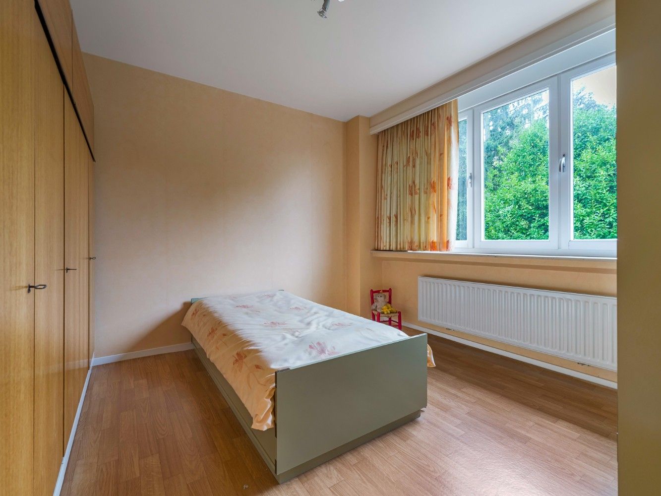 Licht op te frissen woning met 3 slpk. en tuin foto 15