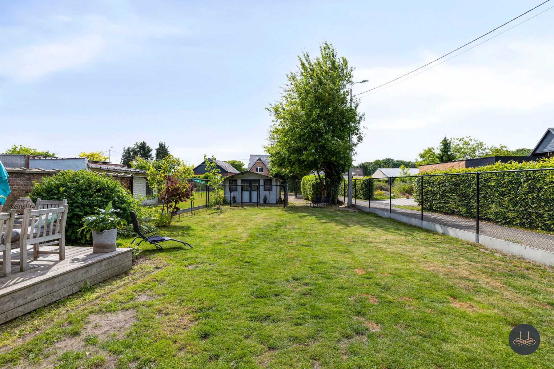 Sfeervolle, deels gerenoveerde woning met ruime diepe tuin foto 21