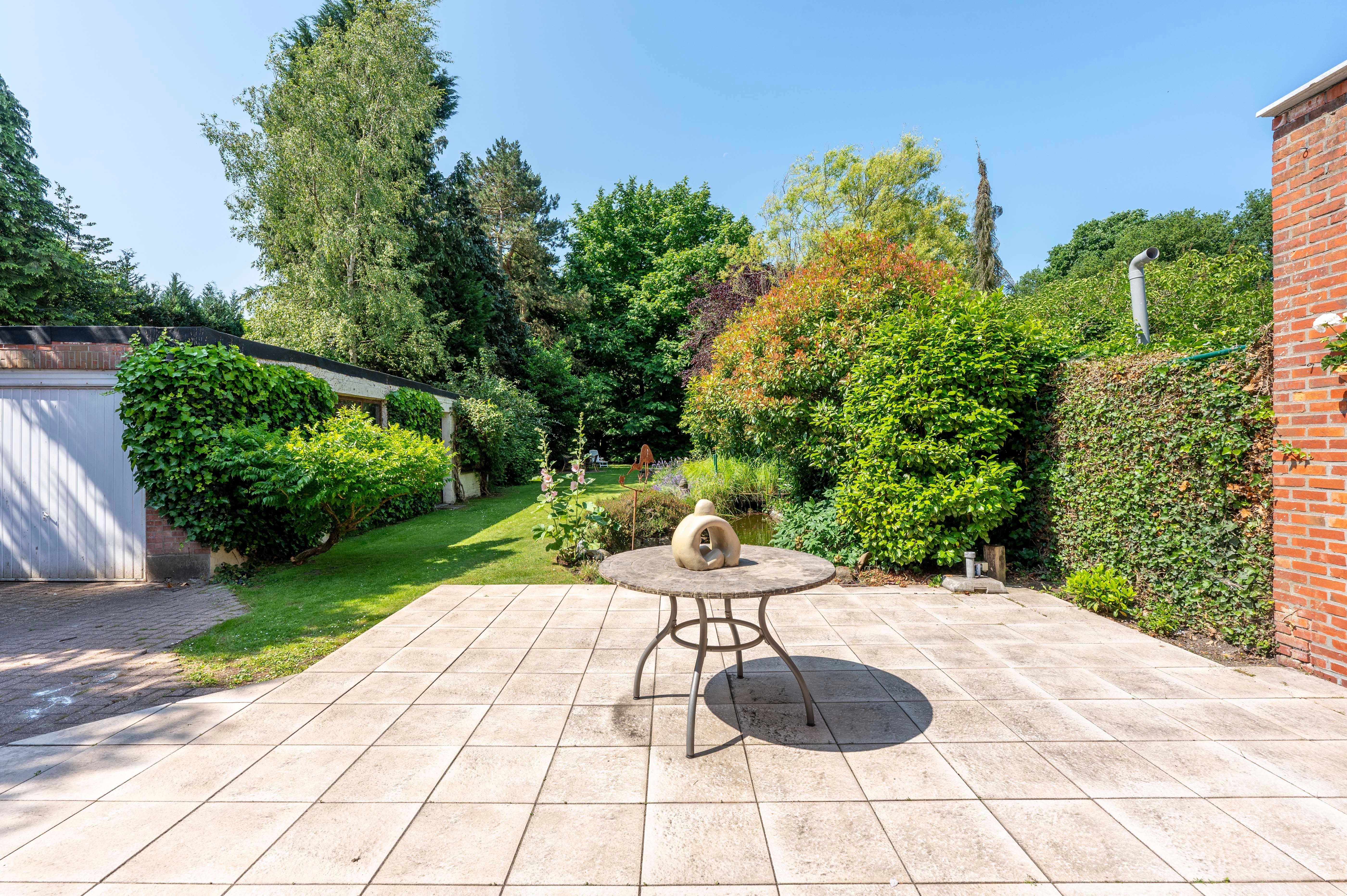 Gezinswoning met grote tuin in kindvriendelijke wijk Driehoek te Brasschaat! foto 15